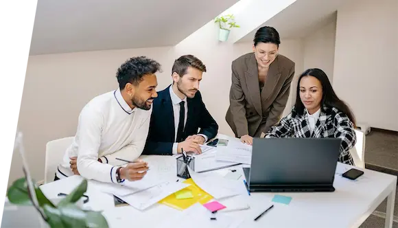 KAPU’s diverse team collaborating to deliver compliant exchange services in Vancouver